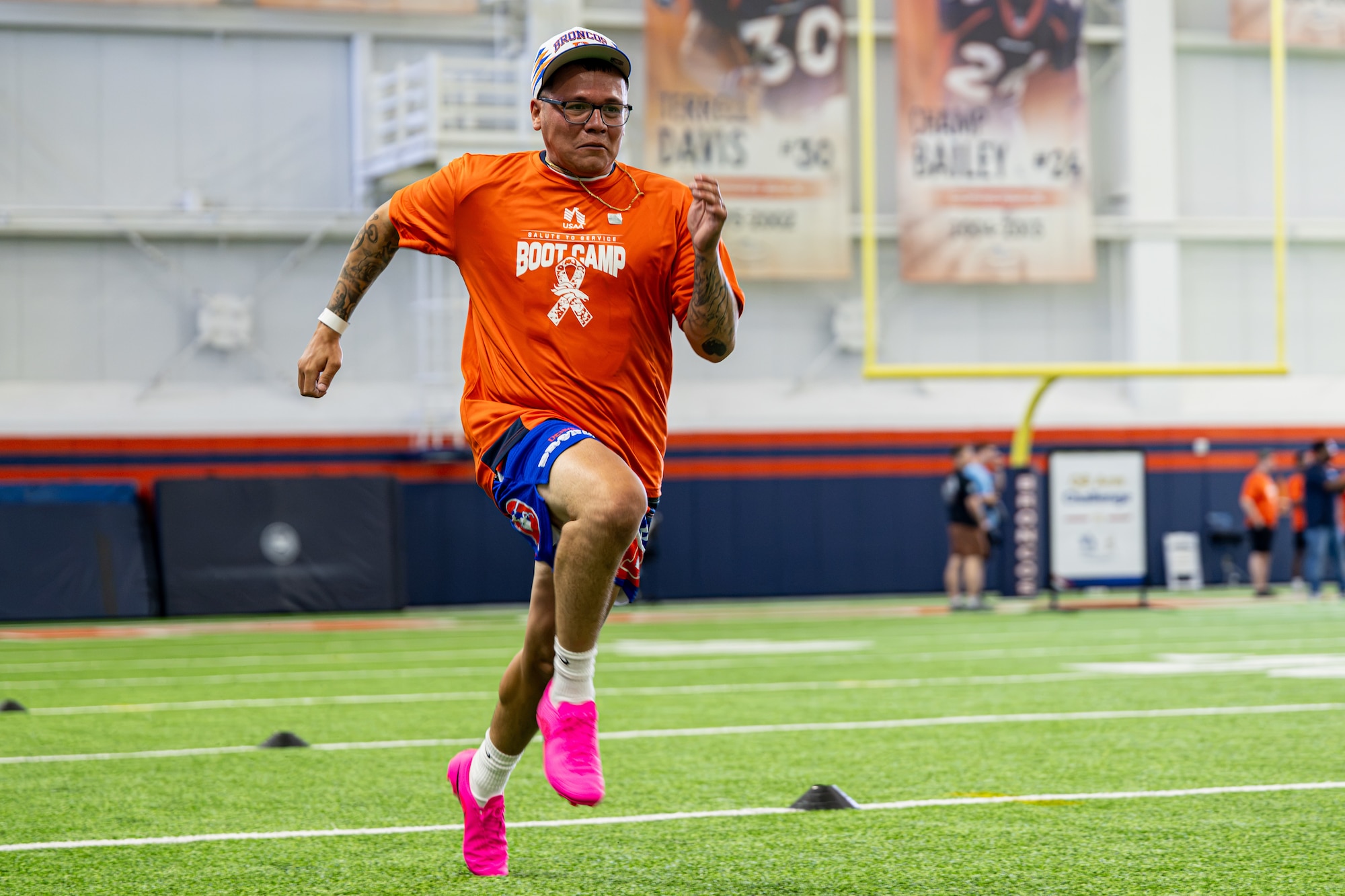 U.S. Air Force Staff Sgt. Jacob Hiatt, 50th Contracting Squadron contracting officer, performs a sprint during the USAA Salute to Service Boot Camp