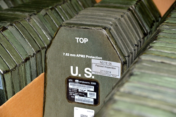A box full of ceramic protective inserts.