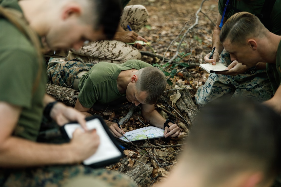 Students with Expeditionary Warfare School, Marine Corps University, participate in the Leadership Decision Making Exercise One at Marine Corps Base Quantico, Virginia, Aug. 21, 2026. Students at EWS participated in decision-forcing cases based on the Battle of Belleau Wood combined with physical training exercises to increase problem-solving skills under pressure. (U.S. Marine Corps photo by Cpl. Joshua Barker)