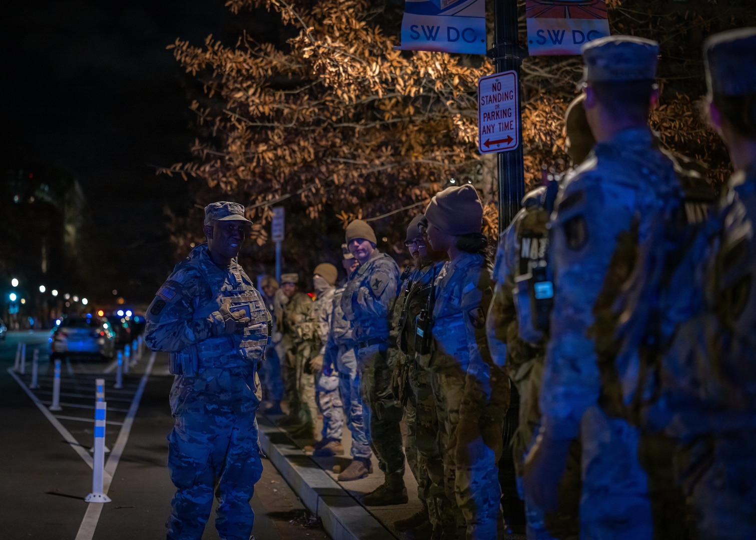 U.S. Army Maj. Edward Lartey, chaplain for the D.C. National Guard, offers words of encouragement to service members gathered at the Eisenhower Memorial ahead of the honor escort—also known as a fallen soldier procession—for U.S. Army Spc. Sarah Beckstrom of the West Virginia National Guard, Nov. 27, 2025. The tradition honors fallen soldiers with silent, unified respect as they are escorted to their final resting place