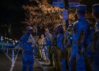 U.S. Army Maj. Edward Lartey, chaplain for the D.C. National Guard, offers words of encouragement to service members gathered at the Eisenhower Memorial ahead of the honor escort—also known as a fallen soldier procession—for U.S. Army Spc. Sarah Beckstrom of the West Virginia National Guard, Nov. 27, 2025. The tradition honors fallen soldiers with silent, unified respect as they are escorted to their final resting place
