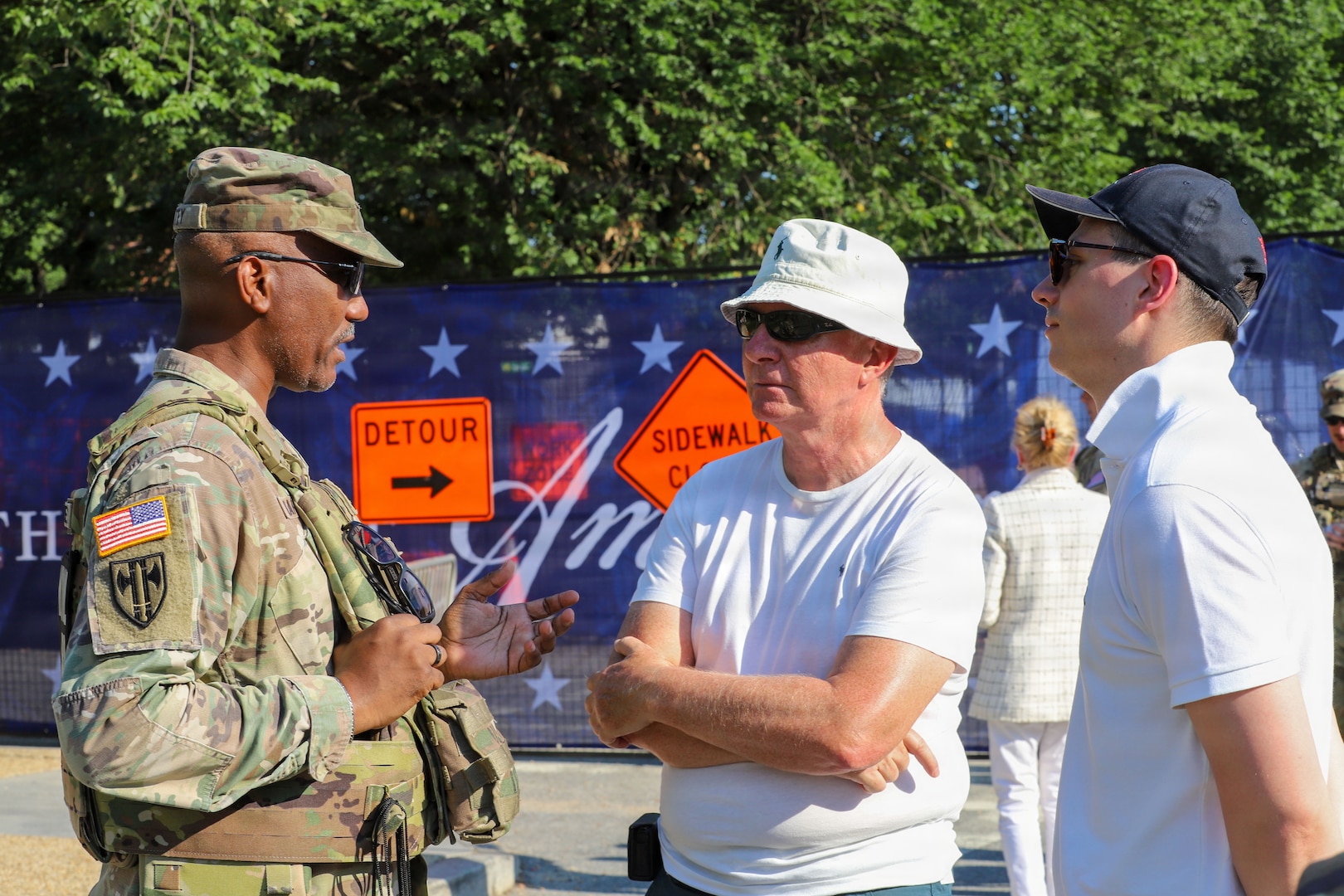 U.S. Army Chaplain Maj. Edward Lartey with the District of Columbia National Guard, assigned to Joint Task Force-District of Columbia in support of the DC Safe and Beautiful mission, speaks with visitors at the Great American State Fair, in Washington, June 25, 2026. About 4,500 National Guard members are supporting the mission, providing critical assistance to the Metropolitan Police Department to help ensure the safety of residents, commuters, and visitors throughout the District.