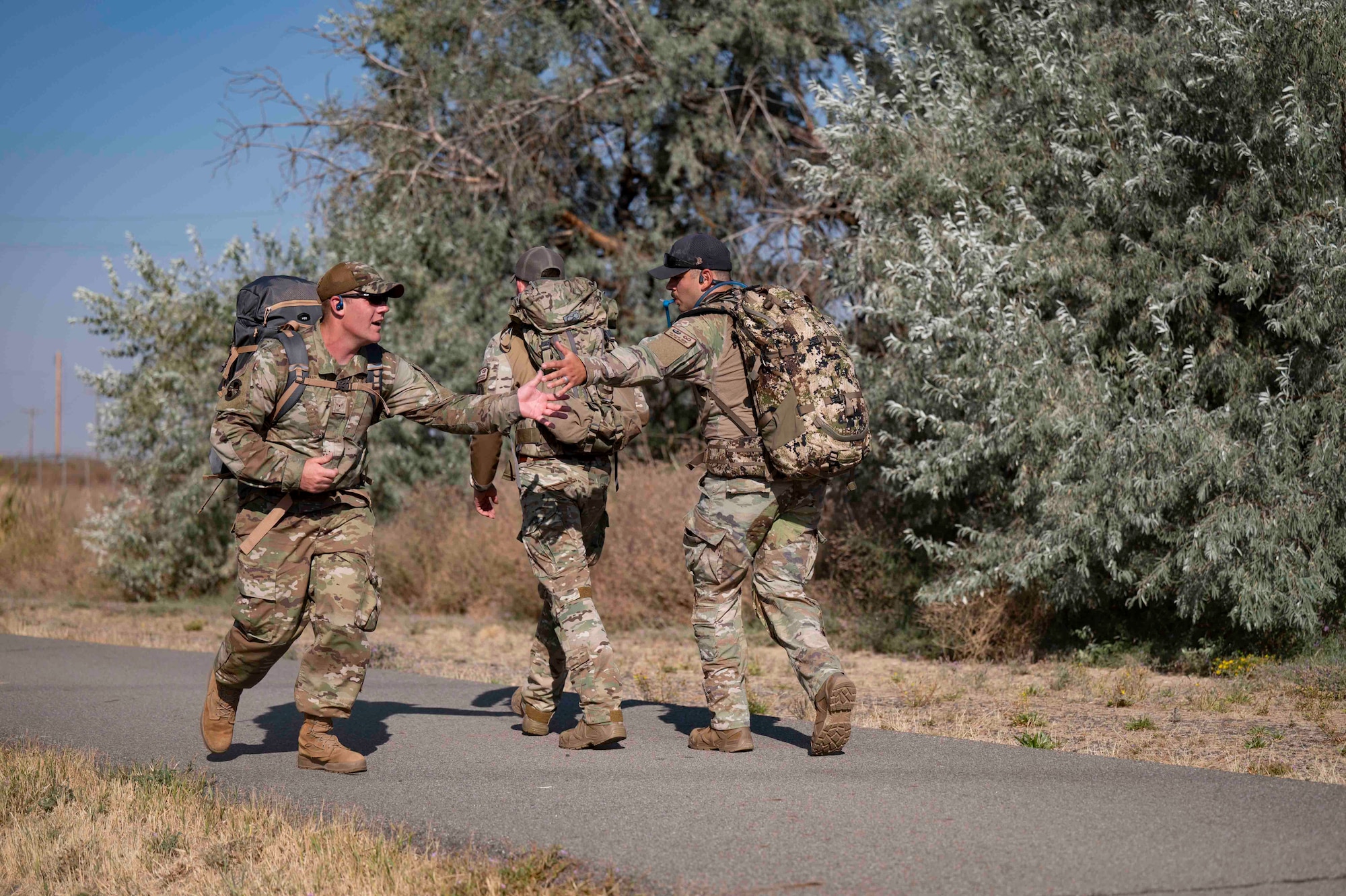 Airmen participate in a ruck.