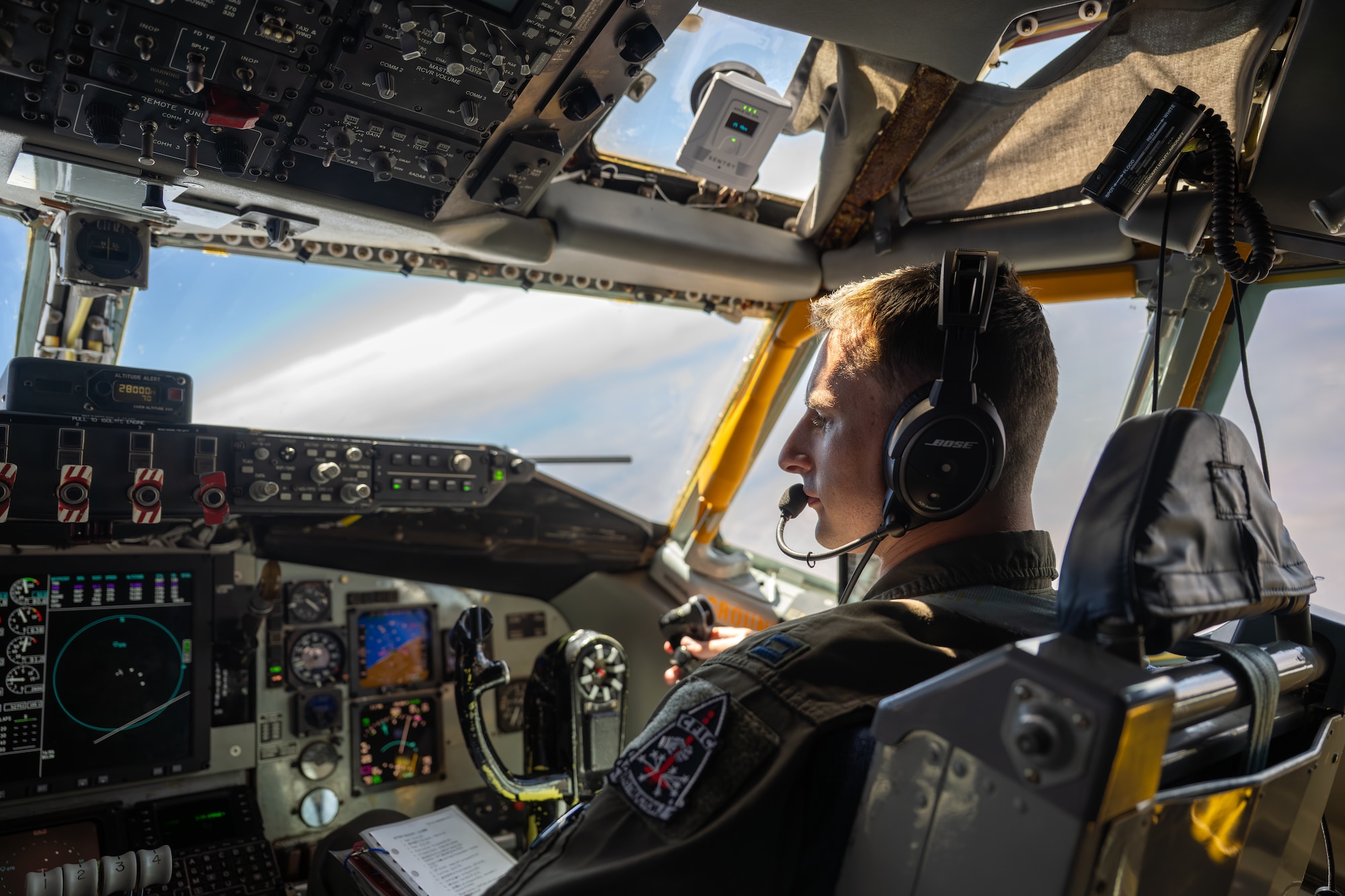 U.S. Air Force Capt. Leif Joffre, 54th Air Refueling Squadron KC-135 formal training unit instructor pilot, operates a U.S. Air Force KC-135 Stratotanker aircraft above northern Oklahoma, Aug. 20, 2026. The KC-135’s ability to in-flight refuel allows other military aircraft to fly longer missions without landing. (U.S. Air Force photo by Airman 1st Class Emma Wright)