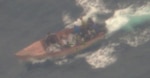 A makeshift vessel carrying 19 aliens onboard just before being interdicted by the Coast Guard Cutter Richard Dixon in Mona Passage waters off Puerto Rico, Aug. 24. 2026.  This interdiction is part of the efforts of the Homeland Security Task Force – San Juan Region to combat human smuggling and deter unlawful maritime migration. (U.S. Coast Guard photo)