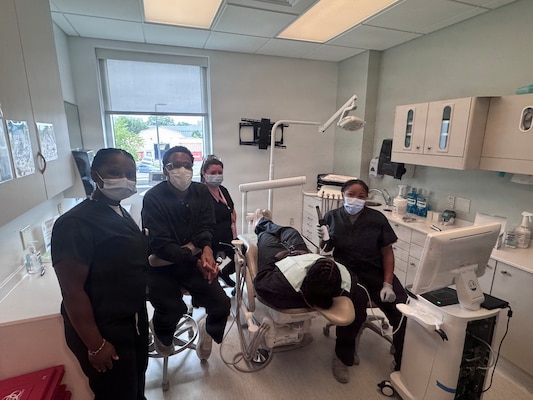 Lt. Cmdr.  Elizabeth Joseph, assigned to Navy Medicine Readiness and Training Unit Portsmouth, NH, and serves as Dental Department Head at the naval health clinic in Portsmouth New Hampshire, leads training focused on dental impressions, digital scanning and clinical photography, August 17, 2026.  By combining advanced technology with foundational clinical skills, Navy dental teams are improving efficiency, strengthening corpsman proficiency and increasing the capabilities available to Sailors and beneficiaries. Hands-on training ensures technicians can sustain their capabilities for contingent environments.   (Photo Credit: Hospital Corpsman First Class Ernesto Espinosacarpio)