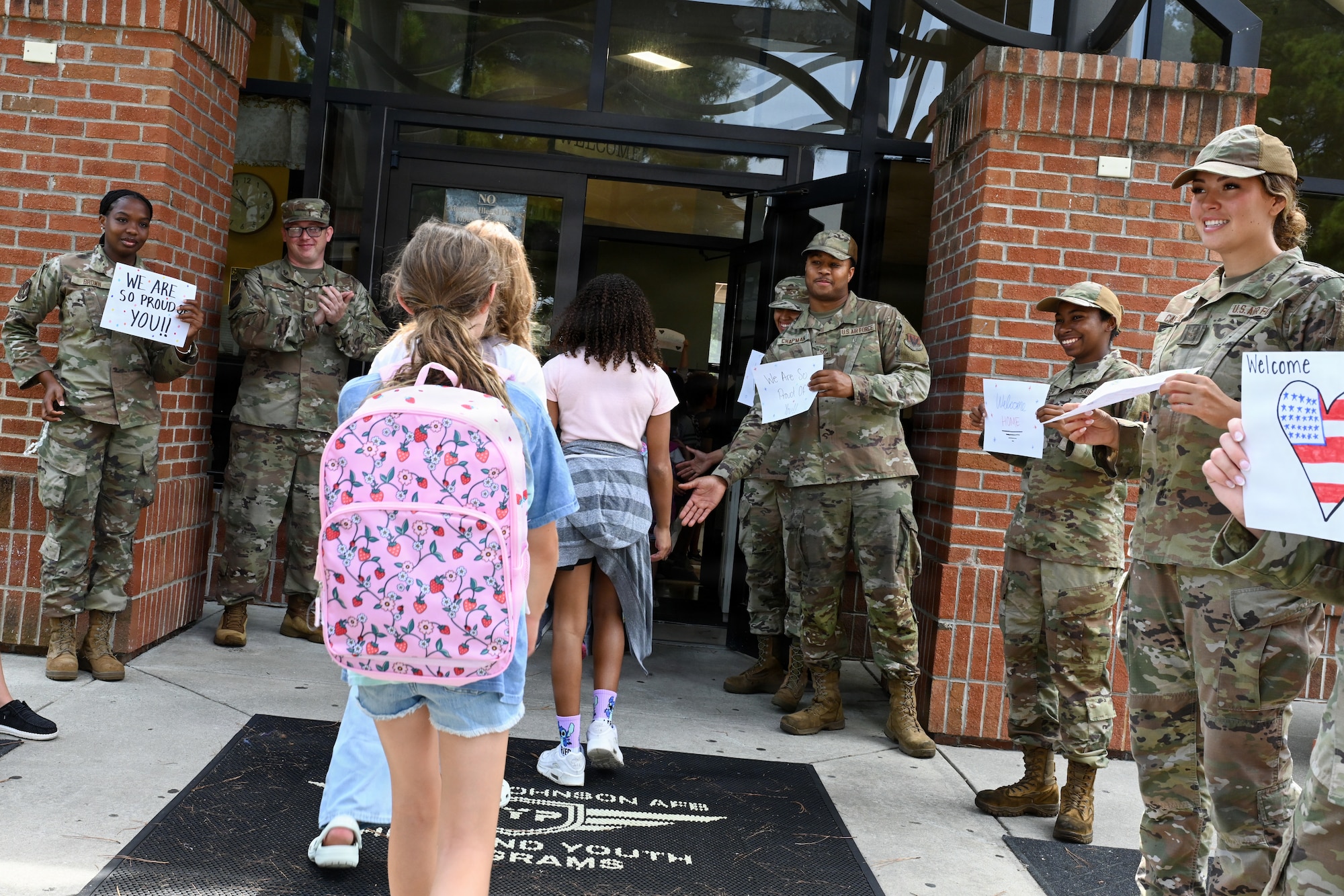 Military children coming home from the mock deployment.