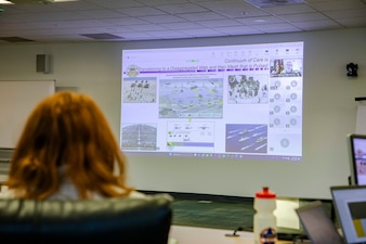 Maj. Gen. Clint Murray, the Joint Staff Surgeon assigned to the Pentagon, discusses operational medical advancements during the Navy Operational Medicine Information Technology & Fielding Summit in Chesapeake, Virginia, Aug. 24, 2026. The five-day summit, held at the CACI Building in Chesapeake, brings together senior leaders from BUMED, Fleet commands, Naval Information Warfare Centers, and Joint Operational Medicine Information Systems teams. The primary objective was to deliver agile, trained, and certified medical units to support the Fleet, Fleet Marine Force and expeditionary medical facilities. (U.S. Navy photo by Mass Communication Specialist 2nd Class Levi Decker)
