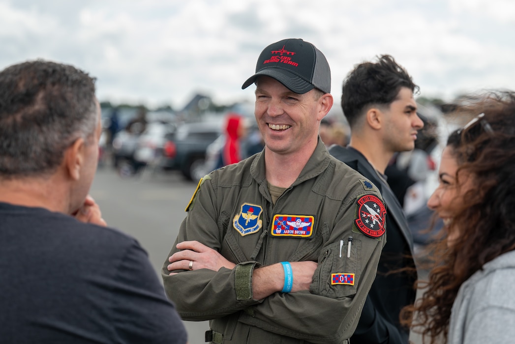 U.S. Air Force Lt. Col. Aaron Brown, 54th Air Refueling Squadron commander, engages with attendees of Airshow London 2026, London, Ontario Aug. 23, 2026. The Altus Air Force Base combined demonstration team had the opportunity to interact with spectators and discuss the capabilities of each airframe. (U.S. Air Force photo by Airman 1st Class Emma Wright)
