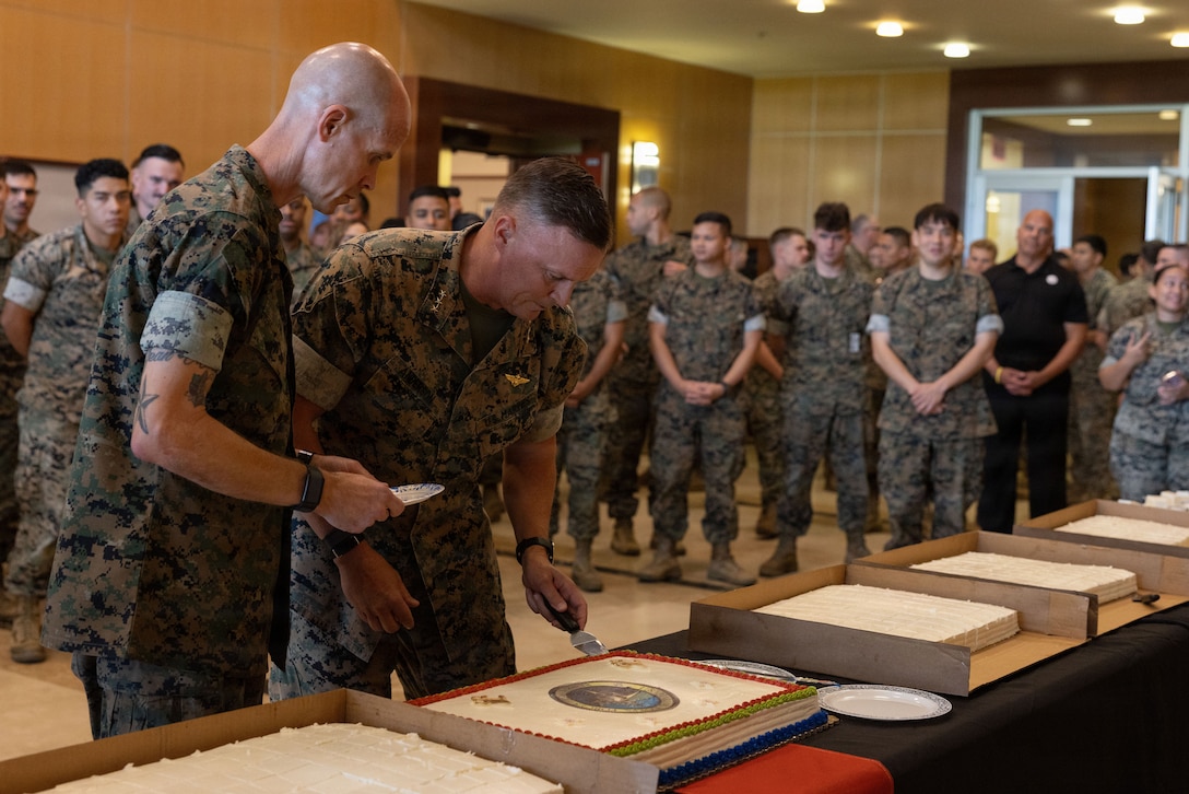 U.S. Marine Corps Lt. Gen Leonard F. Anderson IV, commander, Marine Forces Reserve and Marine Forces South, right, cuts a piece of cake with Sgt. Maj Patrick Fay, sergeant major of Marine Forces Reserve and Marine Forces South, during a cake-cutting ceremony celebrating the 110th birthday of the Marine Corps Reserve at Marine Corps Support Facility New Orleans, Aug. 28, 2026. The ceremony marks the establishment of the Marine Corps Reserve which was officially founded on Aug. 29, 1916, to provide trained and qualified units to support the active-duty component during times of war or national emergency. (U.S. Marine Corps photo by Cpl. Breysson Villacortacampos)