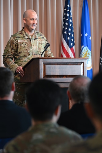 Brig. Gen. Joshua Williams speaks to Department of the Air Force Portfolio Acquisition Executive for Command, Control, Communications and Battle Management personnel and guests during a change of leadership ceremony, here, Aug. 28. Williams officially assumed leadership of the DAF PAE C3BM on July. 31, 2026. The PAE integrates the C3BM materiel enterprise within the department, aligning technical architecture and acquisition authorities to streamline the delivery of decision advantage capabilities via the DAF Battle Network. (Official Air Force Photo by Richard Blumenstein).