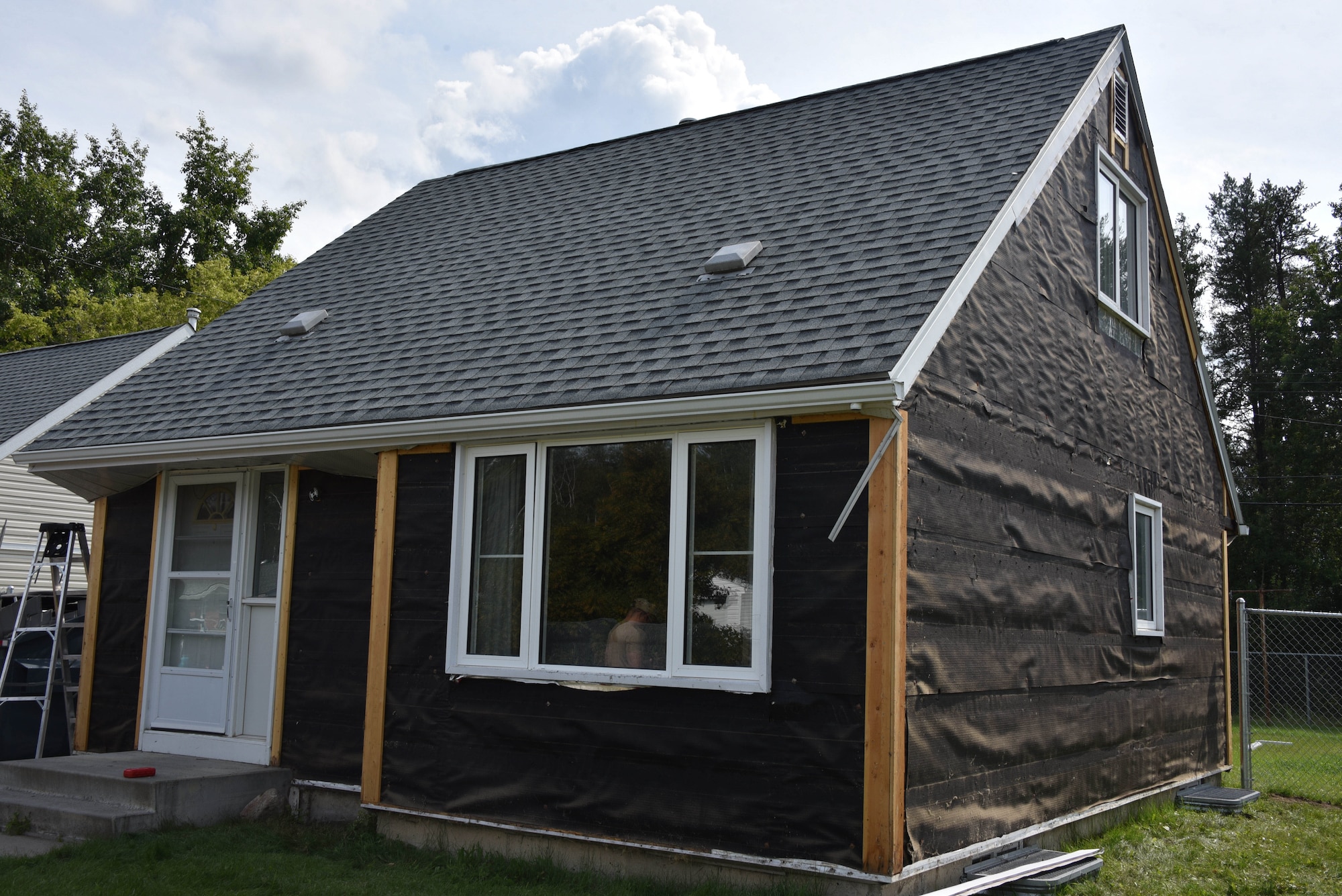 A 4-Wing residential housing unit without outside siding