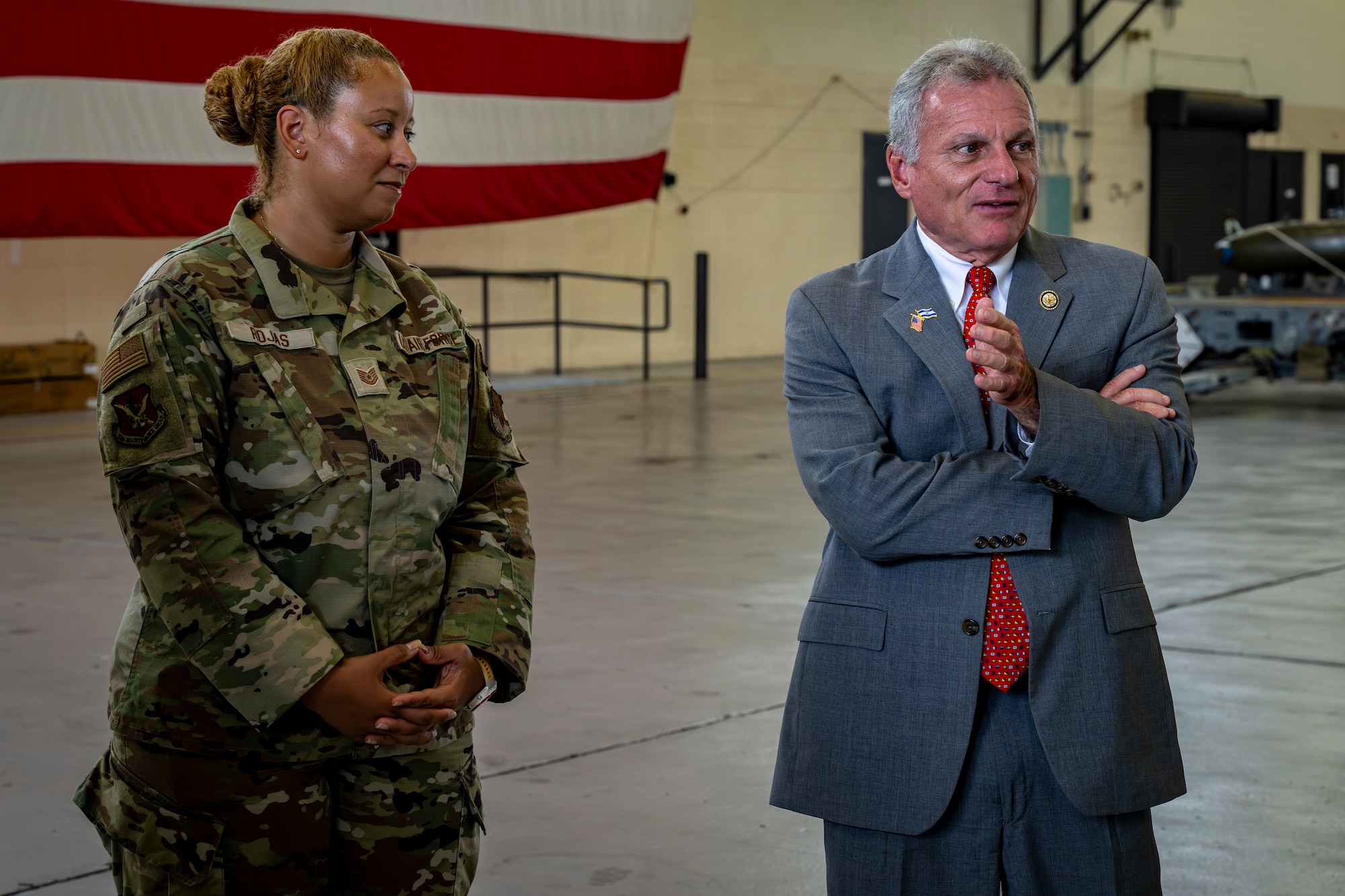 Congressman interacting with airmen