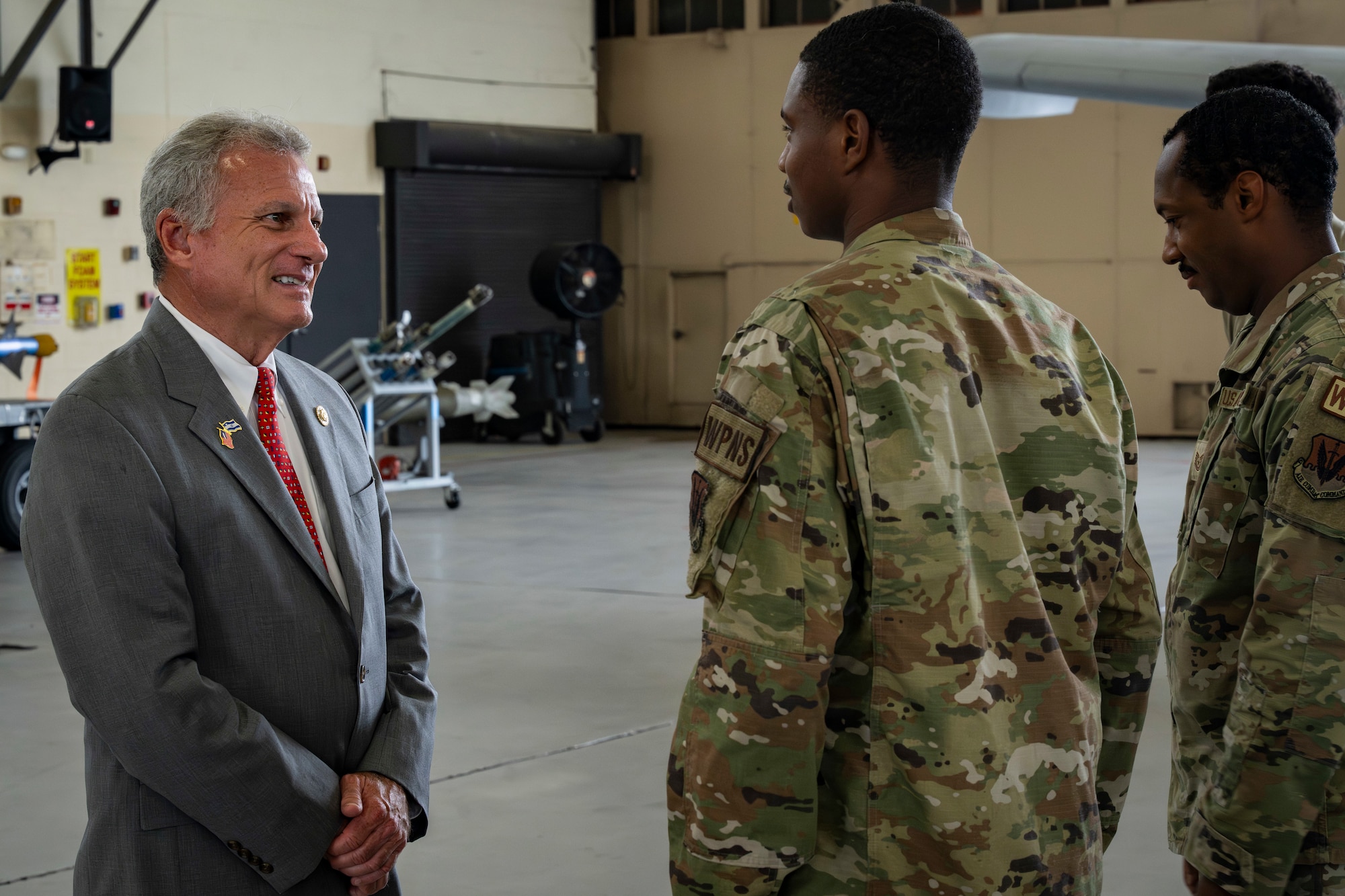 Representative for Georgia’s congressional district, speaks with Airmen