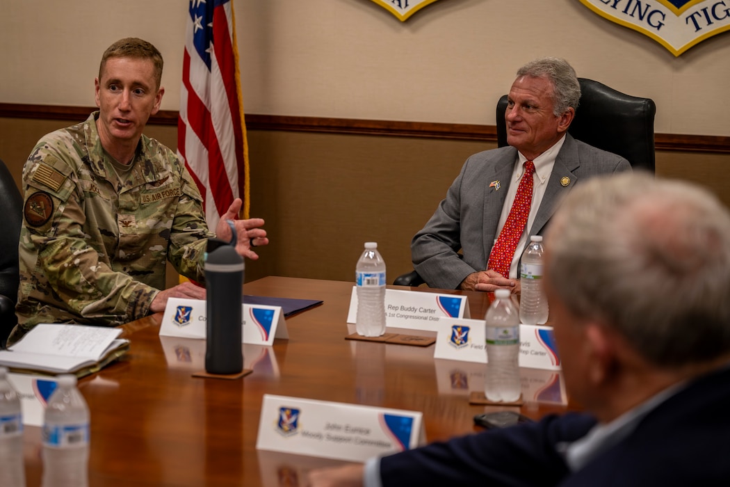 Air Force Colonel interacting with Congressman