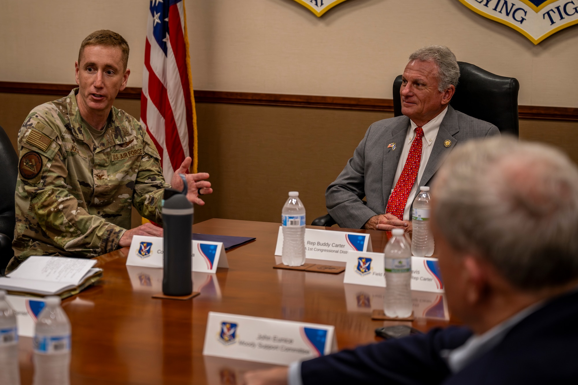 Air Force Colonel interacting with Congressman