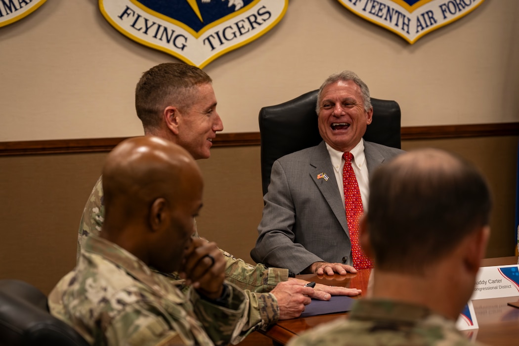 Col and Congressman during a brief