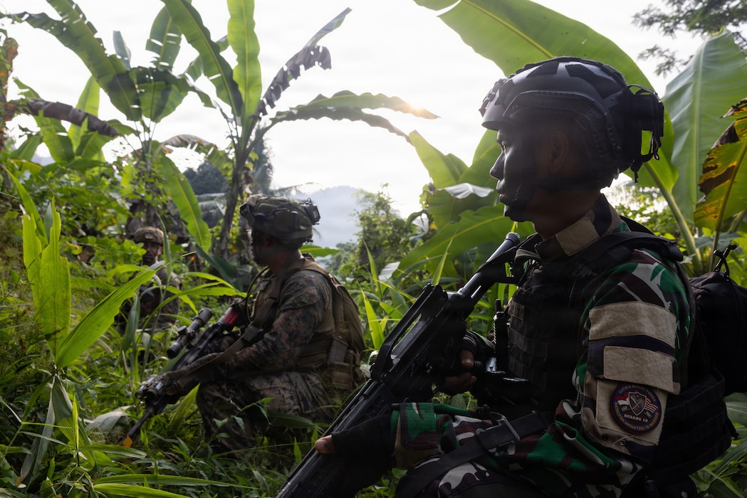 U.S. Marines with Alpha Company, 1st Battalion, 5th Marine Regiment, Marine Rotational Force – Darwin 26, and Indonesian marines with 7th Infantry Battalion, 4th Brigade, provide security during a full mission profile exercise as part of a platoon exchange near Lampung, Indonesia, Aug. 27, 2026.