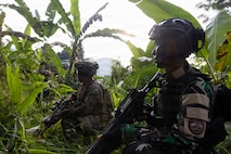 U.S. Marines with Alpha Company, 1st Battalion, 5th Marine Regiment, Marine Rotational Force – Darwin 26, and Indonesian marines with 7th Infantry Battalion, 4th Brigade, provide security during a full mission profile exercise as part of a platoon exchange near Lampung, Indonesia, Aug. 27, 2026.
