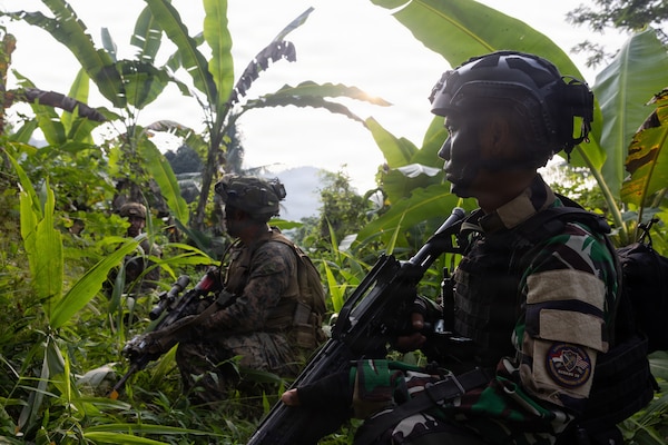 U.S. Marines with Alpha Company, 1st Battalion, 5th Marine Regiment, Marine Rotational Force – Darwin 26, and Indonesian marines with 7th Infantry Battalion, 4th Brigade, provide security during a full mission profile exercise as part of a platoon exchange near Lampung, Indonesia, Aug. 27, 2026.