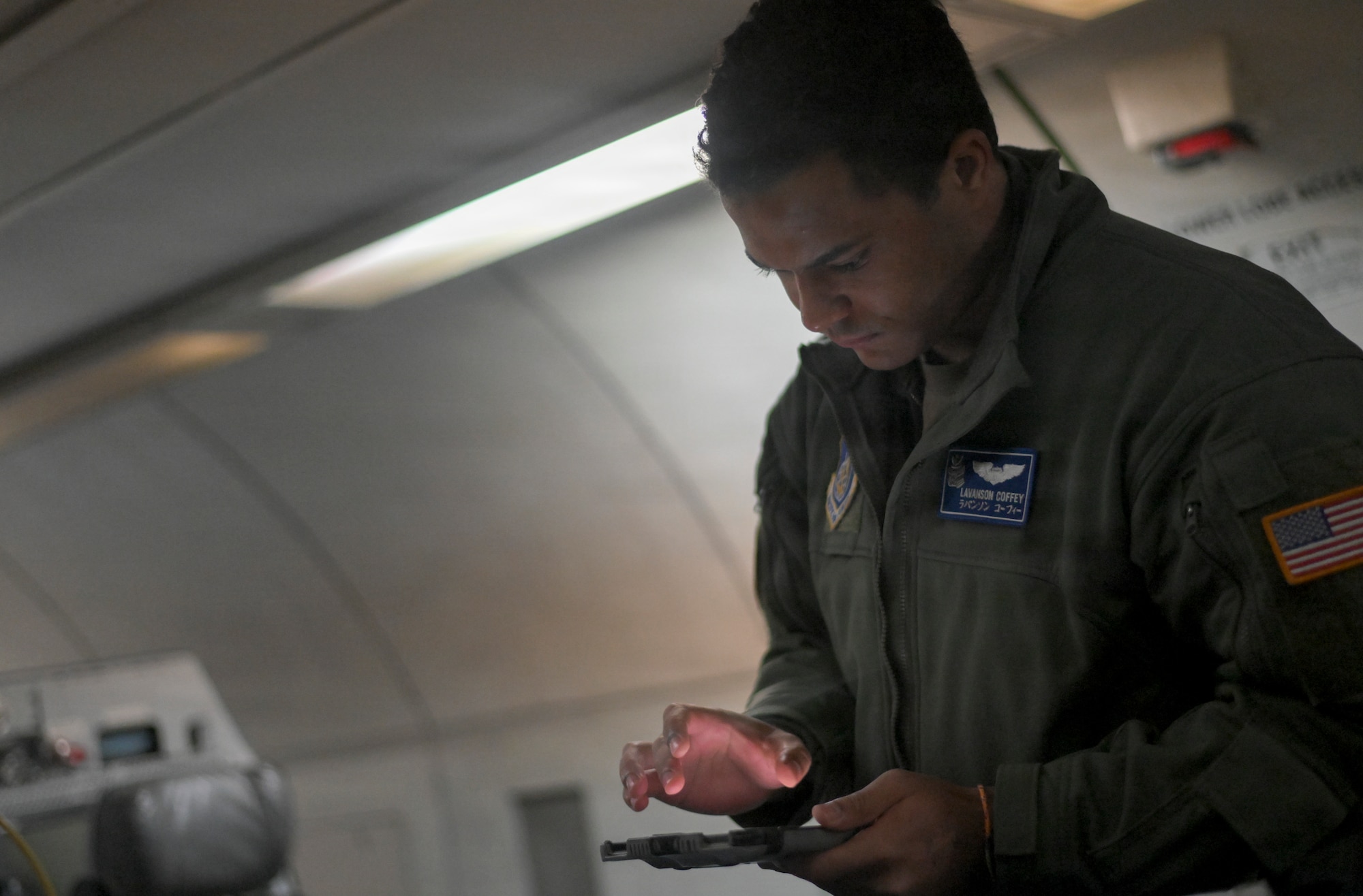 U.S. Air Force Capt. Lavanson Coffey, 961st Airborne Air Control Squadron pilot, performs routine pre-flight checks for an E-3 Sentry Airborne Warning and Control System aircraft assigned to the 962nd Airborne Air Control Squadron during RED FLAG-Alaska 26-3 at Joint Base Elmendorf-Richardson, Aug. 20, 2026. RED FLAG-Alaska directly supports the National Defense Strategy’s peace through strength policy by improving combat readiness and warfighting skills.