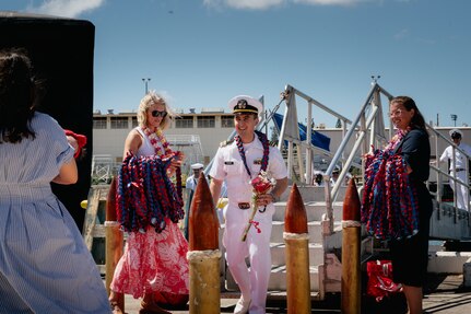JOINT BASE PEARL HARBOR-HICKAM, Hawaii (August 27, 2026) - A Sailor assigned to Virginia-class fast-attack submarine USS Montana (SSN 794), greets his family as Montana returns to Joint Base Pearl Harbor-Hickam from deployment, August 27, 2026. Montana is assigned to Submarine Squadron 1 and is capable of supporting various missions, including anti-submarine warfare, anti-surface ship warfare, strike warfare, and intelligence, surveillance, and reconnaissance (U.S. Navy photo by Sonar Technician 3rd Class Cannen Tukes).