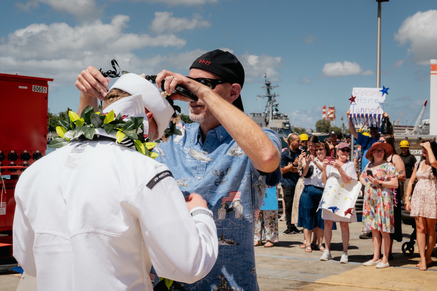 JOINT BASE PEARL HARBOR-HICKAM, Hawaii (August 27, 2026) - A Sailor assigned to Virginia-class fast-attack submarine USS Montana (SSN 794), is greeted by his family as Montana returns to Joint Base Pearl Harbor-Hickam from deployment, August 27, 2026. Montana is assigned to Submarine Squadron 1 and is capable of supporting various missions, including anti-submarine warfare, anti-surface ship warfare, strike warfare, and intelligence, surveillance, and reconnaissance (U.S. Navy photo by Sonar Technician 3rd Class Cannen Tukes).