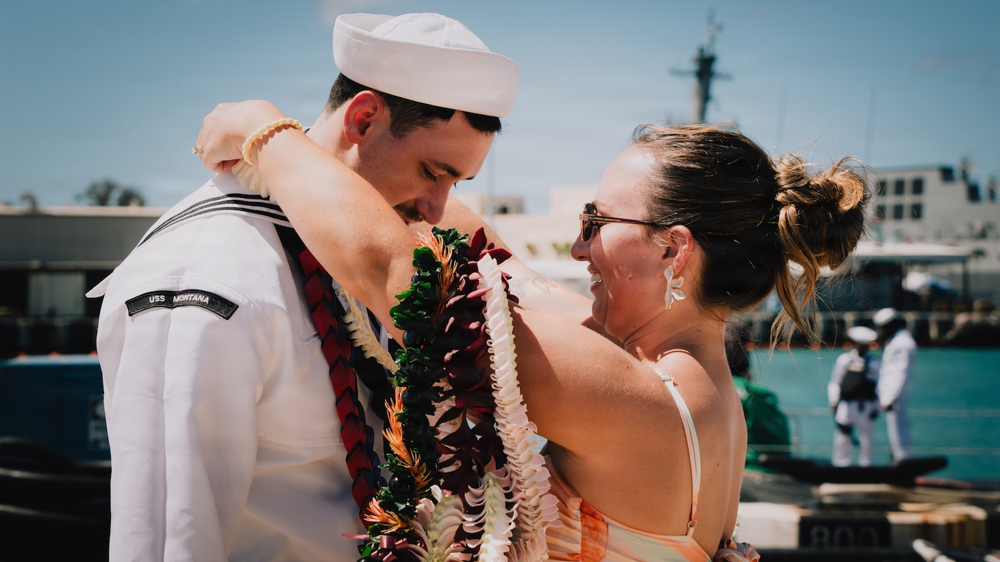 JOINT BASE PEARL HARBOR-HICKAM, Hawaii (August 27, 2026) - A Sailor assigned to Virginia-class fast-attack submarine USS Montana (SSN 794), greets his family as Montana returns to Joint Base Pearl Harbor-Hickam from deployment, August 27, 2026. Montana is assigned to Submarine Squadron 1 and is capable of supporting various missions, including anti-submarine warfare, anti-surface ship warfare, strike warfare, and intelligence, surveillance, and reconnaissance (U.S. Navy photo by Mass Communication Specialist 2nd Class Nicholas Russell).