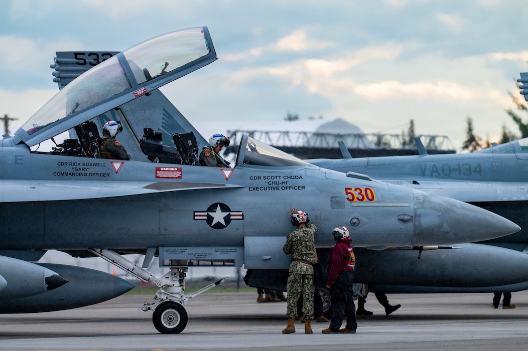 U.S. Sailors assigned to Electronic Attack Squadron 134 prepare an EA-18G Growler for flight during RED FLAG-Alaska 26-3 at Eielson Air Force Base, Alaska, Aug. 17, 2026.