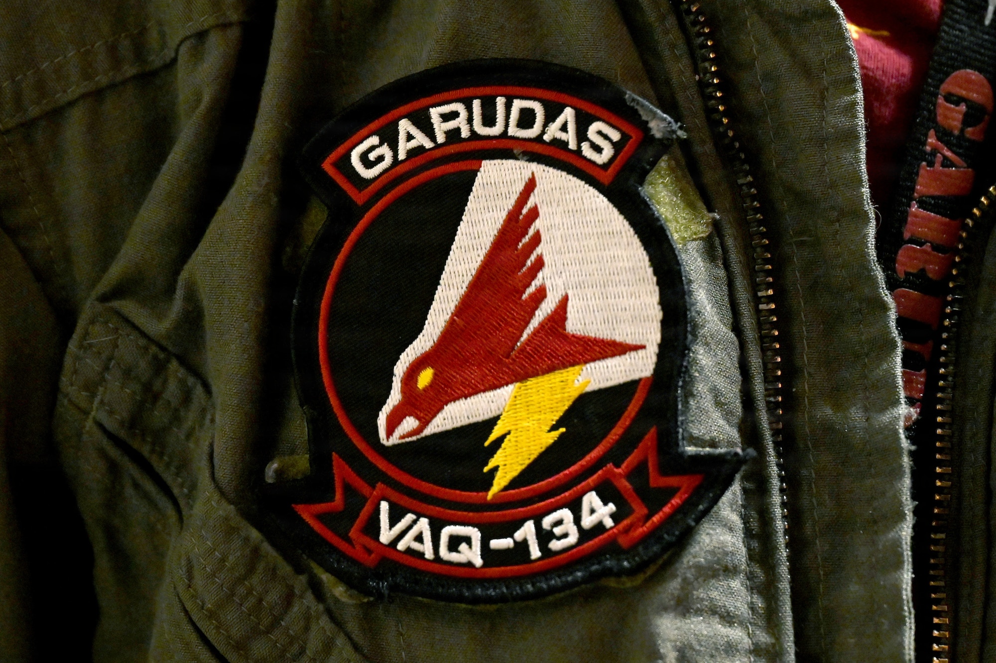 U.S. Navy Lt. Susan Johnson, Electronic Attack Squadron 134 EA-18G Growler pilot, wears a VAQ-134 patch during RED FLAG-Alaska 26-3 at Eielson Air Force Base, Alaska, Aug. 25, 2026.