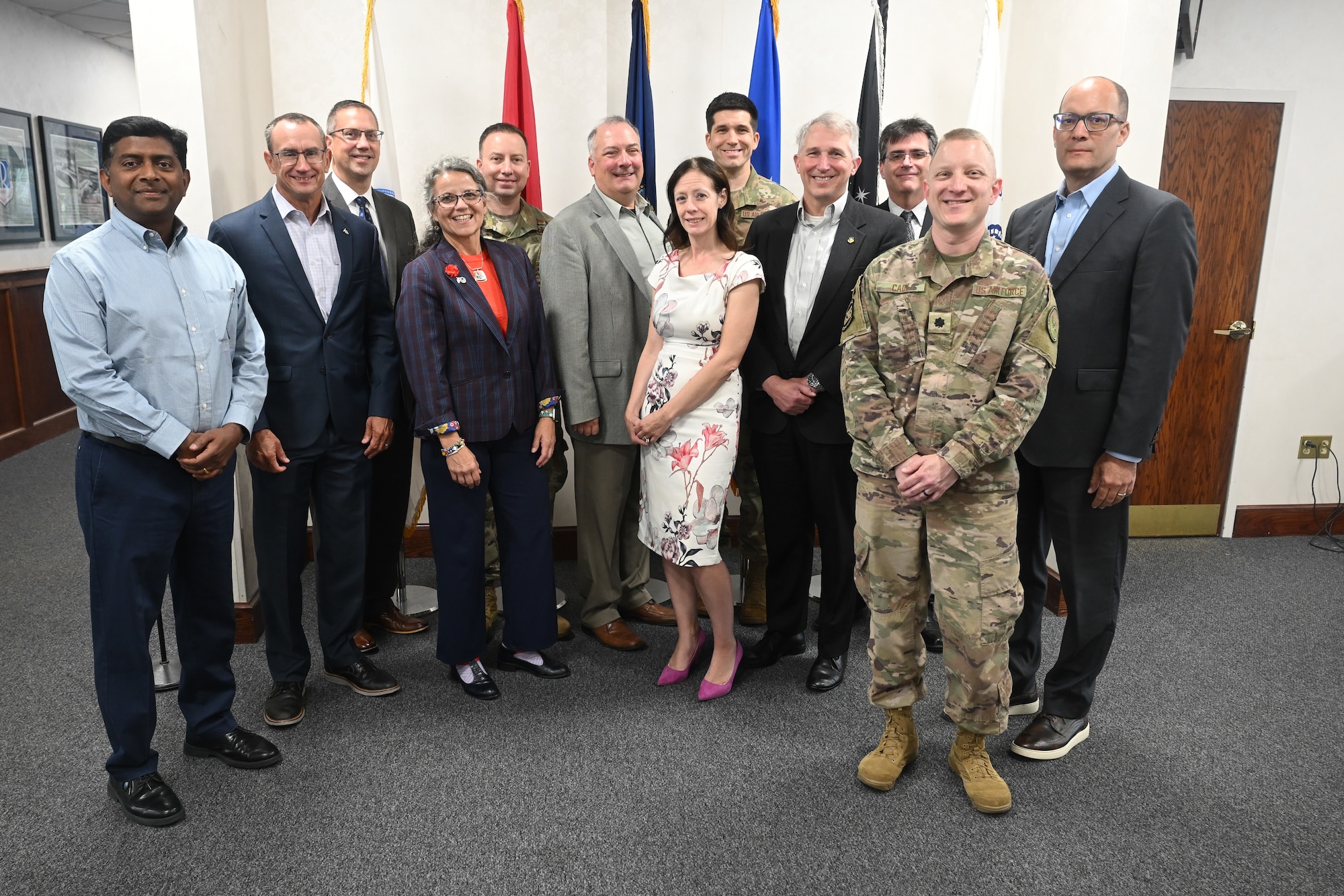 Airmen and lead scientists from across the Air Force pose for a photo during the Air Force Technology Horizons, Engineering, and Advisory Panel, here, July 21. The ATHENA panel consists of representatives who bridge the gap between the scientific community and various operational commands from across the Air Force. Kessel Run is a division focused on delivering resilient command and control and targeting software capabilities that provide operators with decision advantage. (Official Air Force photo by Richard Blumenstein).