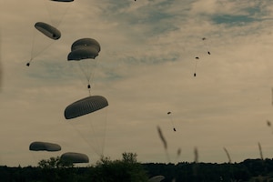 Supplies rest on the ground after being dropped from the sky during exercise Saber Junction 26 at the Joint Multinational Readiness Center’s Hohenfels Training Area, Germany, Aug. 24, 2026. The 7th Army Training Command provides a unique environment in Europe to develop leaders and formations who are prepared for large-scale combat operations, improving readiness. (U.S. Army photo by Spc. Aubrey Boyle, JMRC Vipers)