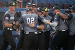Services members compete during the Armed Forces Softball Championships at Devon Park in Oklahoma City, Oklahoma, August 26-29, 2026. Service members competed for championship honors while representing their respective services.