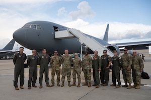 U.S. Air Force Airmen assigned to the 305th Air Mobility Wing and 108th Wing, New Jersey Air National Guard, pose for a group photo at Joint Base McGuire-Dix-Lakehurst, N.J., Aug. 8, 2026.