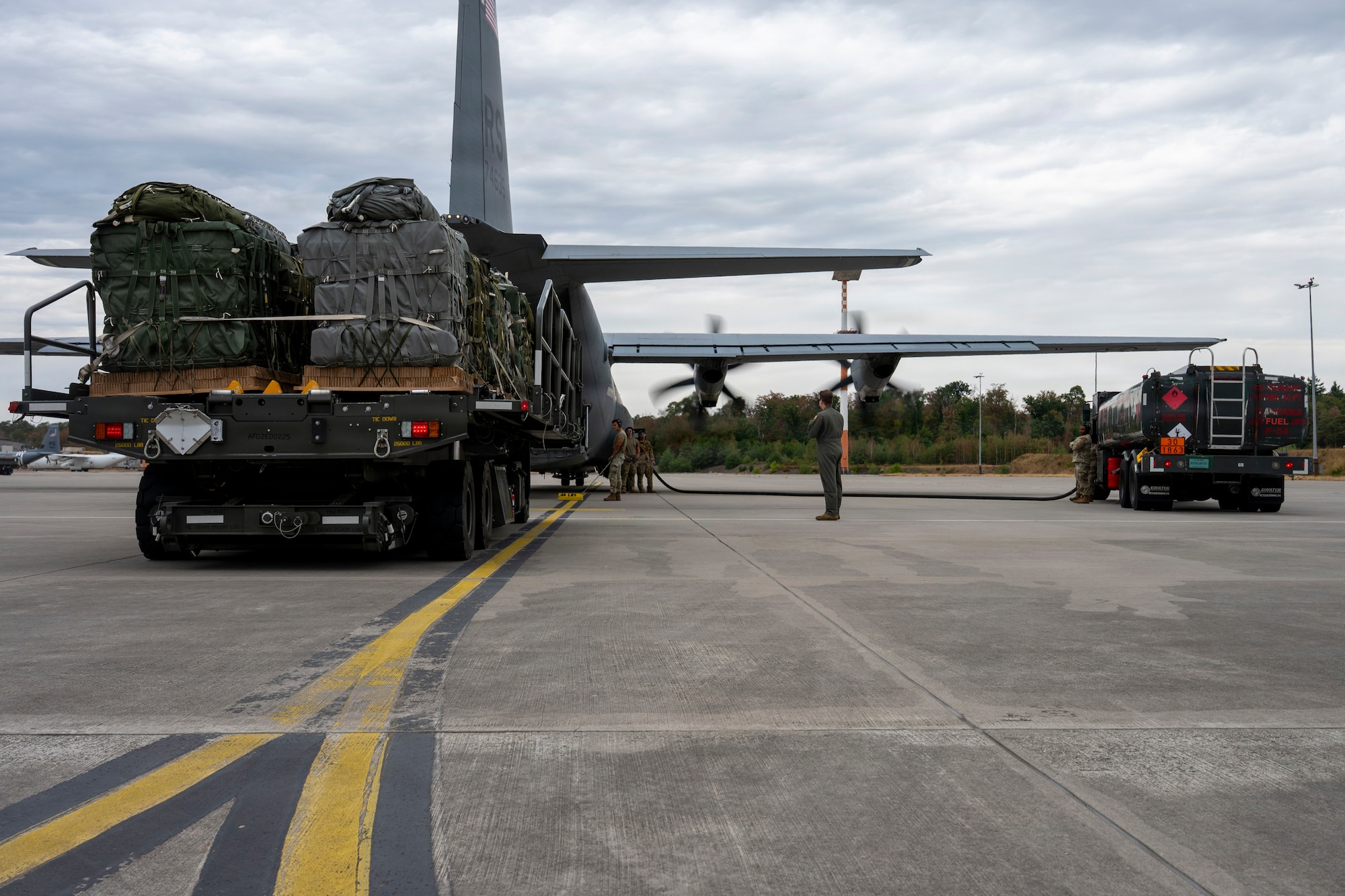 U.S. Air Force Airmen with the 86th Airlift Wing perform simultaneous engines-running onload and hot pit refueling on a C-130J Super Hercules aircraft during exercise Saber Junction 26 at Ramstein Air Base, Germany, Aug. 24, 2026.