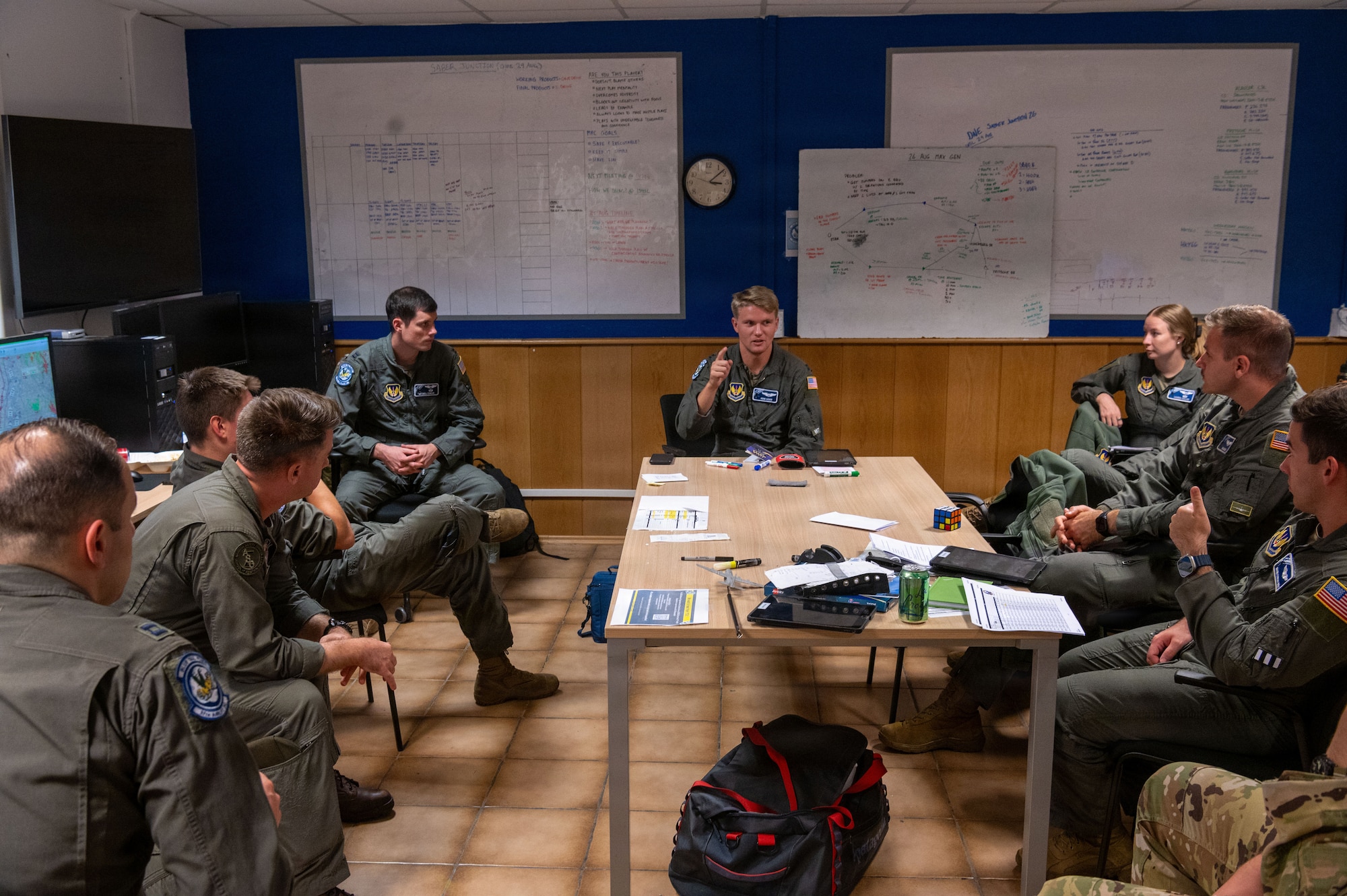 37th Airlift Squadron and Marine Aerial Refueler Transportation Squadron 234 pilots meet in the Mission Planning Center during Saber Junction 26 at Ramstein Air Base, Germany, Aug. 25, 2026.