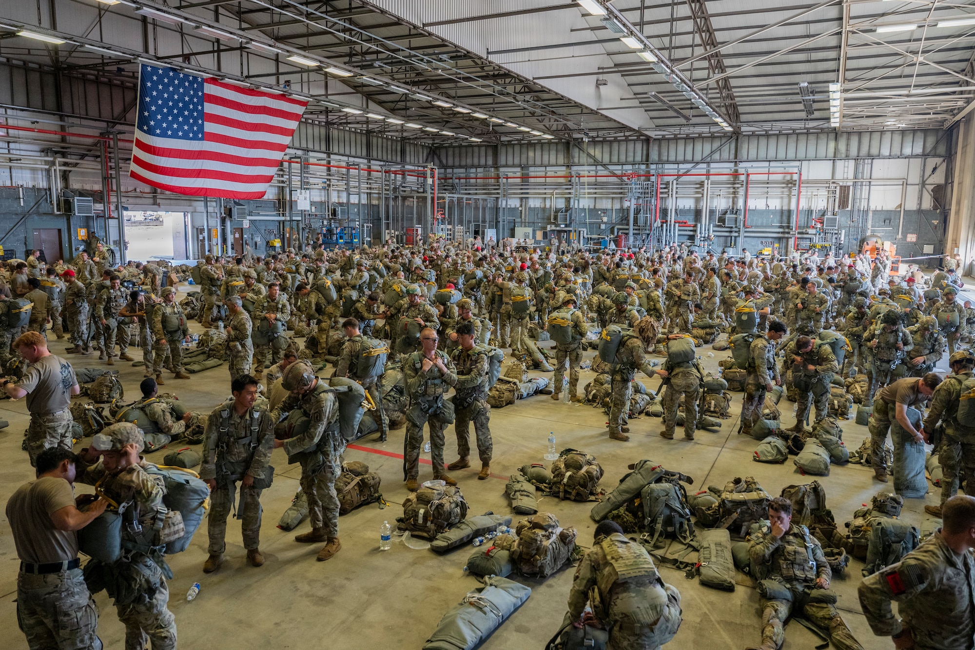 U.S. Army paratroopers prepare for a joint forcible entry operation during exercise Saber Junction 26 at Ramstein Air Base, Germany, Aug. 26, 2026.