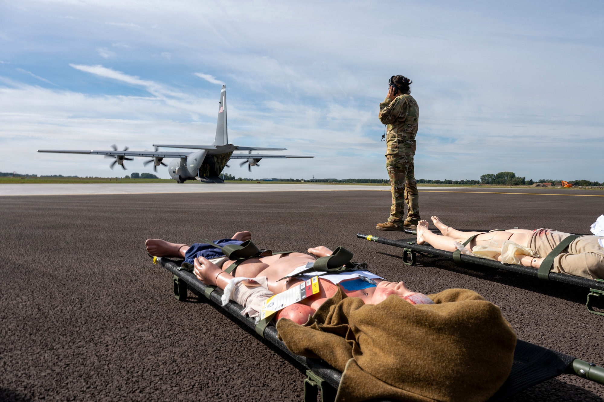 U.S. Air Force Staff Sgt. Renata Rodriguez-Koke, 86th Aeromedical Evacuation Squadron AE technician, prepares to load simulated casualties during exercise Agile Gateway at Chièvres Air Base, Belgium, Aug. 24, 2026.