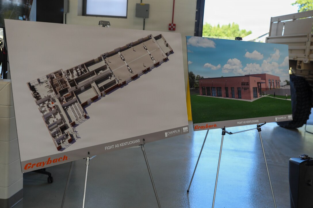 Images of the plans for the new Field Maintenance Shop 7 in Burlington, Kentucky are displayed during the ribbon-cutting ceremony Aug. 24, 2026.