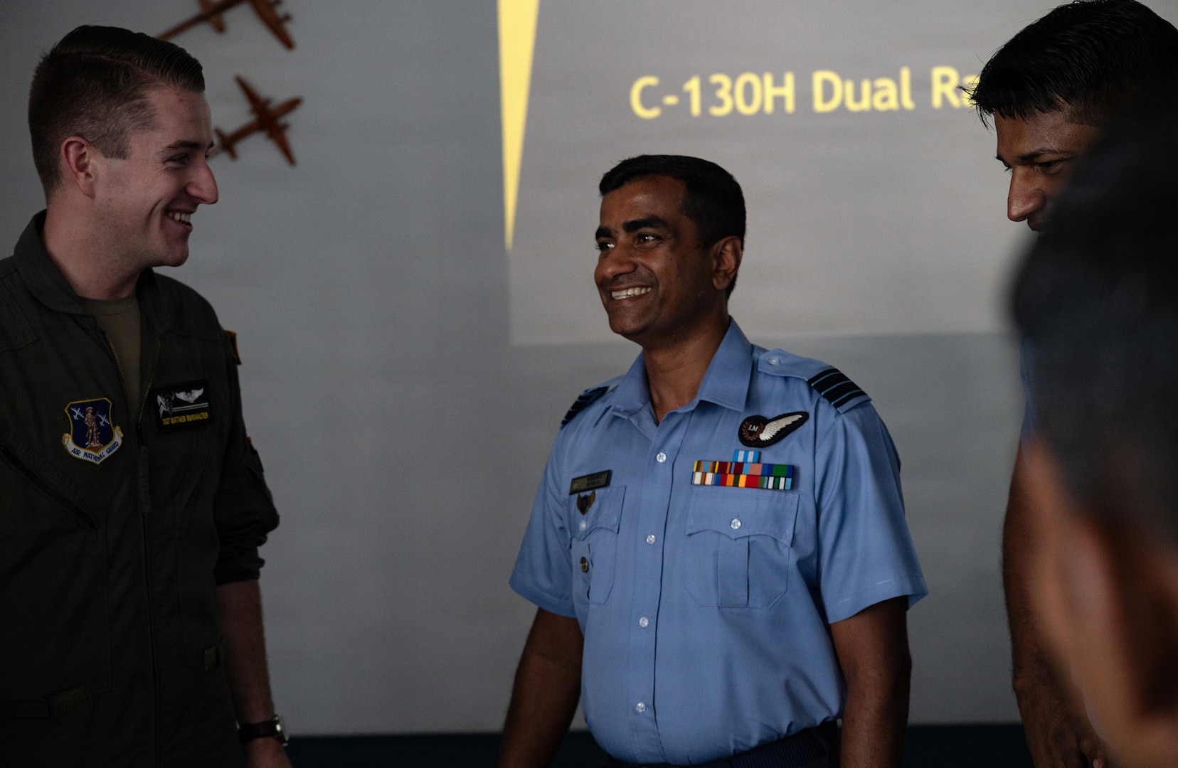 A Montana Air National Guard Airman and a Sri Lanka Air Force officer discuss C-130H operations during a subject-matter expert exchange as part of Atlas Angel II at Sri Lanka Air Force Base Katunayake, Sri Lanka, Aug. 31, 2026.