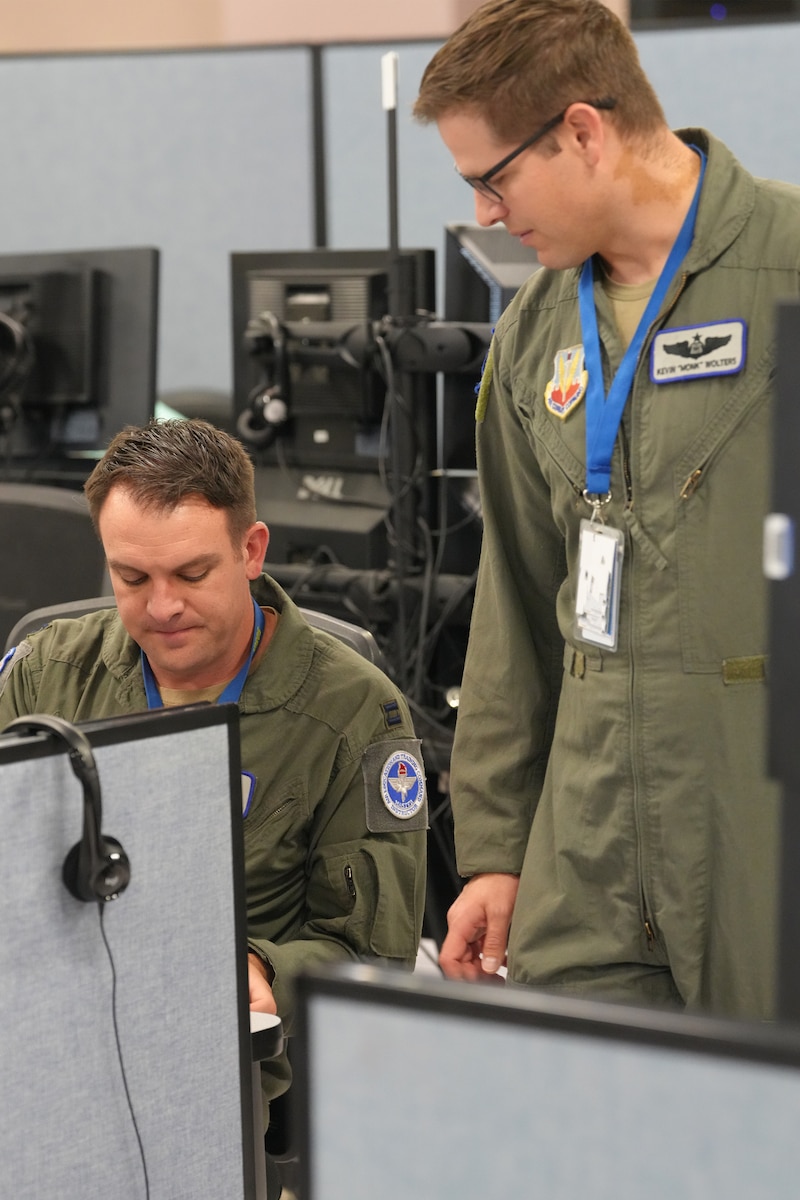 U.S. Air Force warfighters work on computers