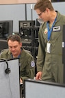U.S. Air Force warfighters work on computers