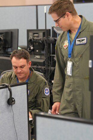 U.S. Air Force warfighters work on computers