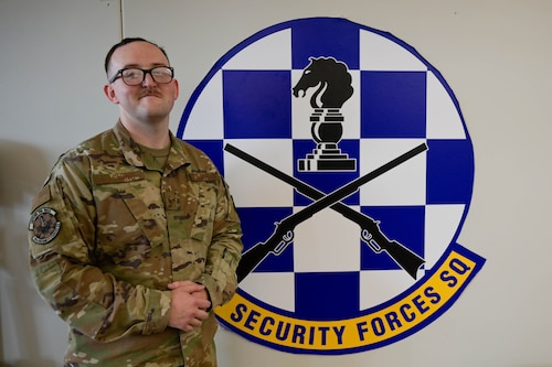 An Airman poses for a photo.
