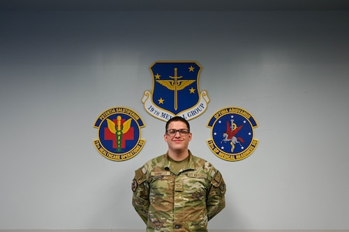 An Airman poses for a photo.