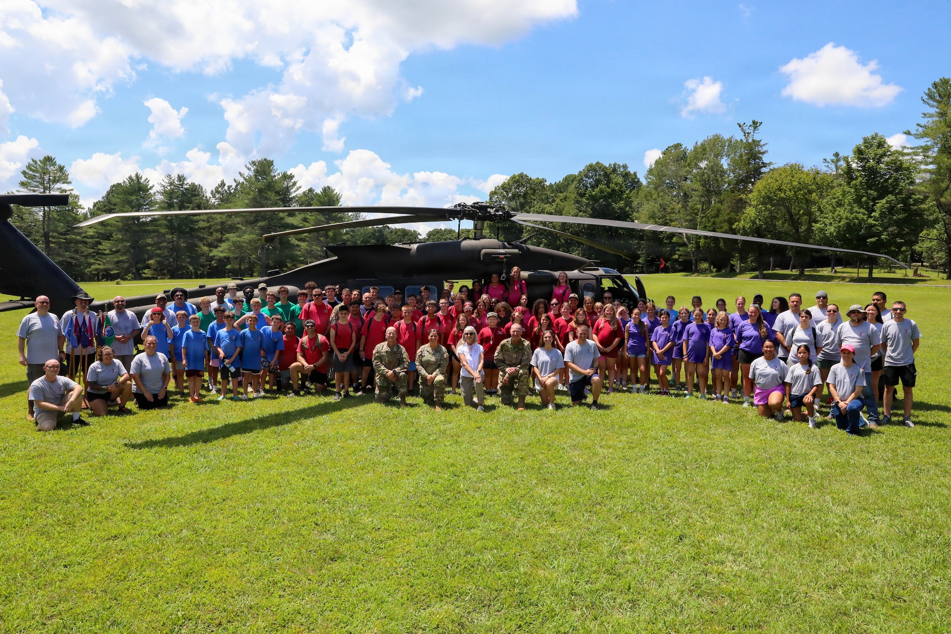 Kentucky National Guard senior leaders join campers for a group photo in front of a UH-60 Black Hawk helicopter during the annual Kentucky National Guard Youth Camp at Camp Loucon in Leitchfield, Kentucky, July 16, 2026.
