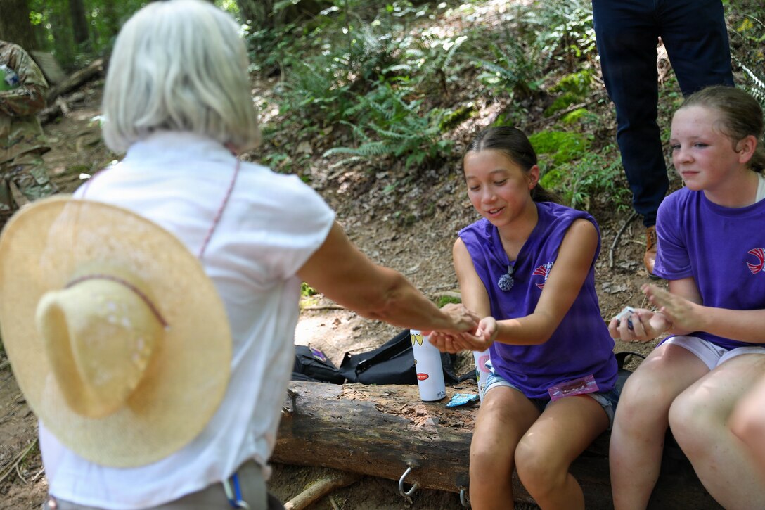 Karen Lamberton, spouse of the adjutant general, Maj. Gen. Haldane Lamberton, presented challenge coin to Molly Yinshaw for her hard work and leadership during the week of the Kentucky National Guard's Youth Camp, July 16, 2026.