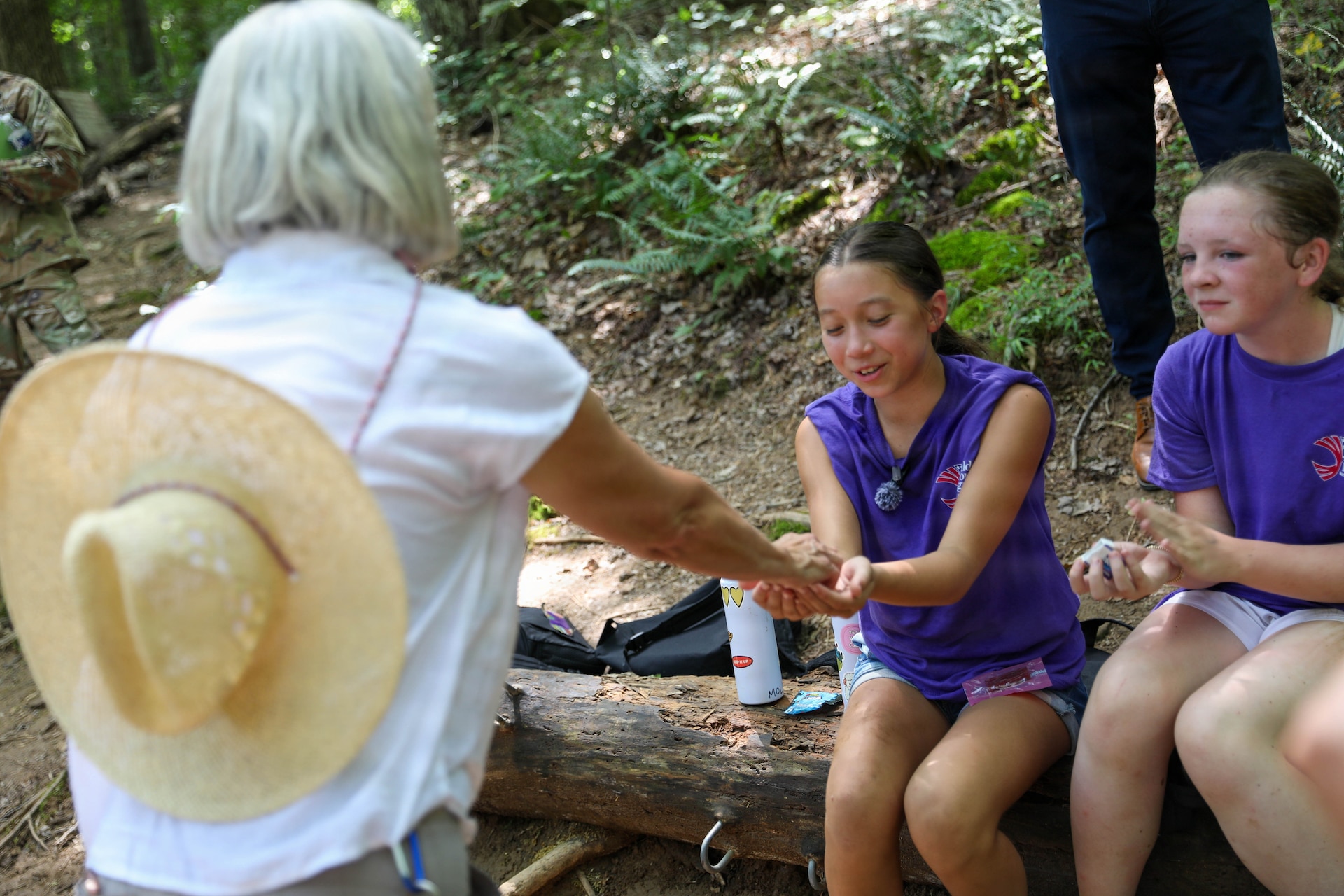 Karen Lamberton, spouse of the adjutant general, Maj. Gen. Haldane Lamberton, presented challenge coin to Molly Yinshaw for her hard work and leadership during the week of the Kentucky National Guard's Youth Camp, July 16, 2026.