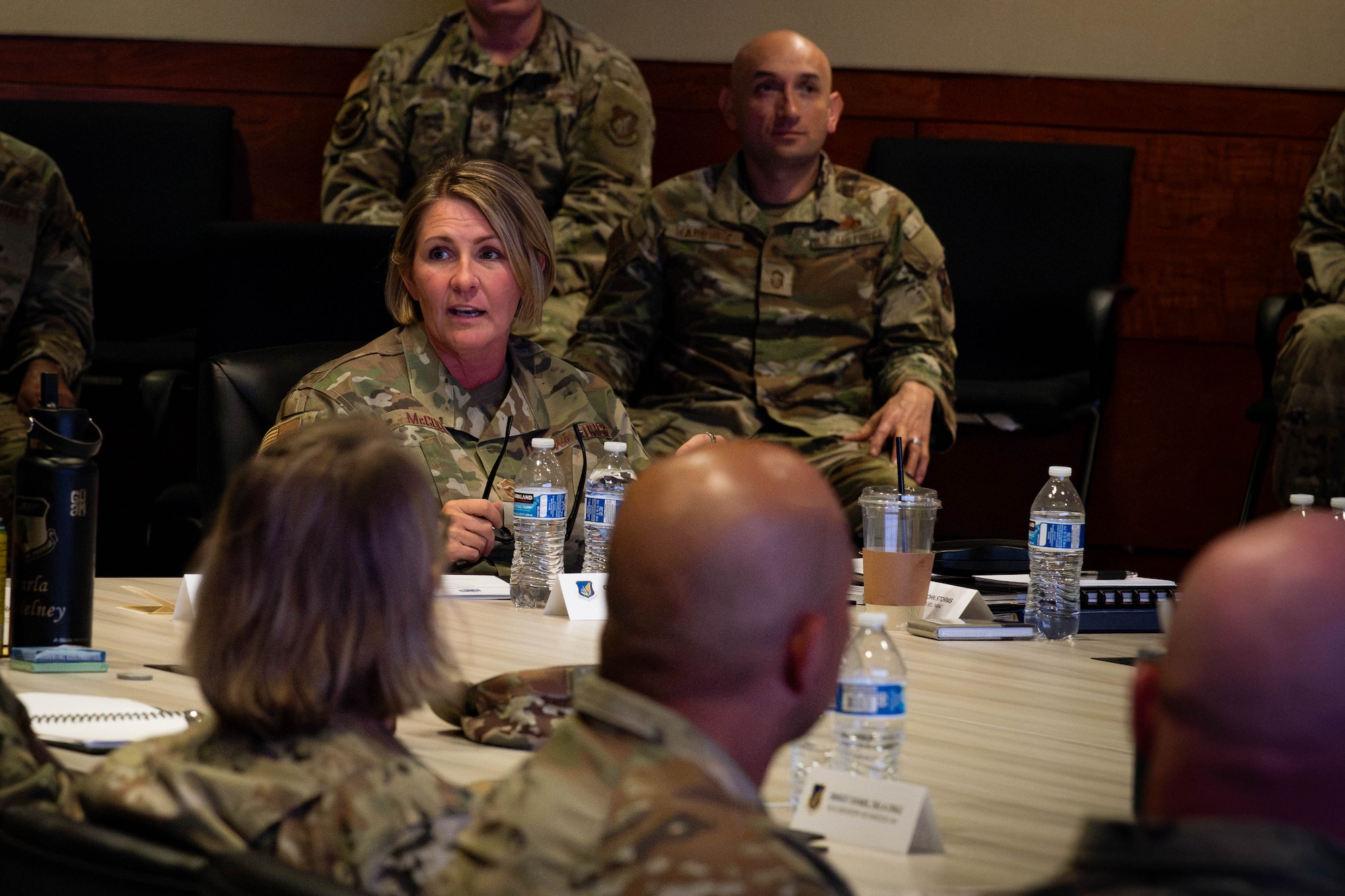 U.S. Air Force Chief Master Sgt. Katie McCool, Pacific Air Forces command chief, addresses attendees during her "PACOM Air Component Perspective" presentation at the Arctic Warrior Event Center on Joint Base Elmendorf-Richardson, Alaska, Aug. 18, 2026. The presentation was delivered as part of the 2026 PACAF Chief Orientation, a conference bringing together senior enlisted leaders across the command to focus on operational readiness and force development. (U.S. Air Force photo by Airman 1st Class Theodore Gowdy)