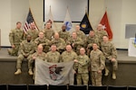 Approximately 20 Illinois Army National Guard soldiers with the Bilateral Embedded Staff Team (BEST) A11 were recognized during a Freedom Salute Ceremony at Camp Lincoln in Springfield, Ill., March 22, 2014. The BEST A11 soldiers deployed to Afghanistan and returned home December 2013. (U.S. Army National Guard photo by Sgt. 1st Class Kassidy L. Snyder/Released)